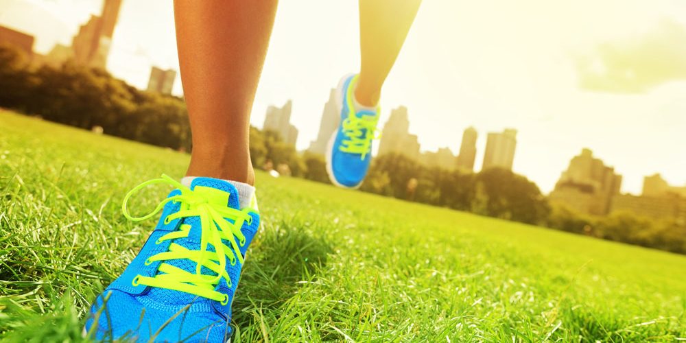 15150282 – running shoes closeup of woman barefoot running shoes
