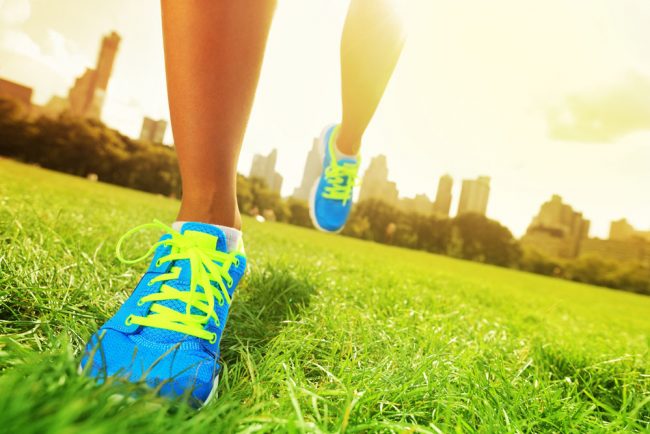 15150282 – running shoes closeup of woman barefoot running shoes